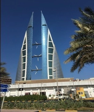 A red and white building with a clock tower.